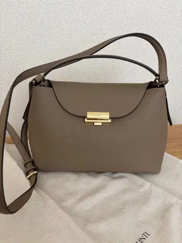 베이지 가죽 핸드백 PUNTI