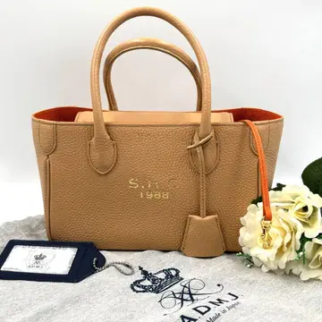 새상품급 A.D.M.J 에이 디 엠 제이 가죽 토트백 부속물 있음