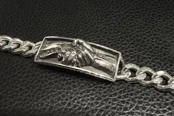 M.W.O.B.H.M / handshake bracelet