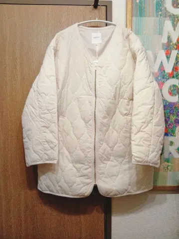 아이보리 퀼팅 자켓
