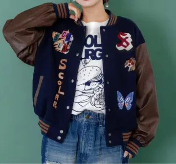 [스칼라] 멜톤 x 인조 가죽 이종 소재 절개 바시티 자켓