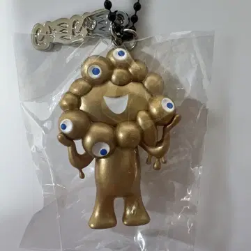 미야쿠미야쿠 오사카 엑스포 골드 컬러 미야쿠미야쿠 입체 PVC 키링