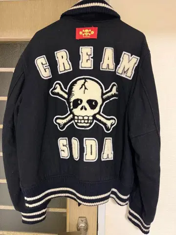 CREAM SODA 스컬 자수 바시티 자켓