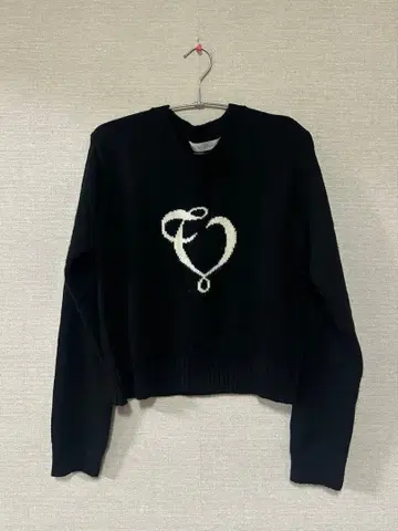 the Virgins Heart logo knit