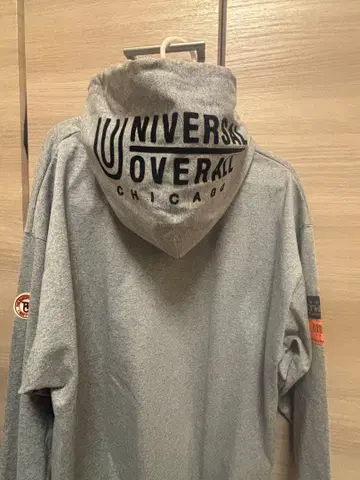 UNIVERSAL OVERALL x ATHLETA 그레이 후드티
