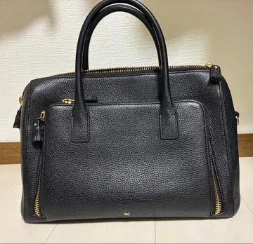 안야 힌드마치 맥시 지퍼 탑 핸들 백 블랙