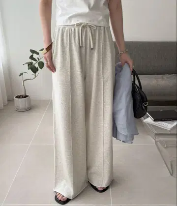 DISCOAT 라이트 베이지 와이드 팬츠