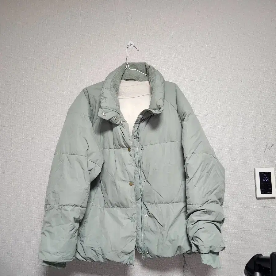 Mint colored short padding jumper