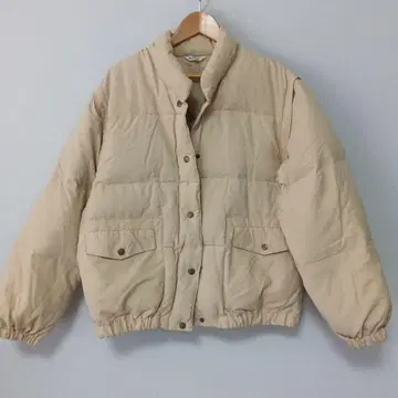 베이지 다운 자켓 베스트 타입