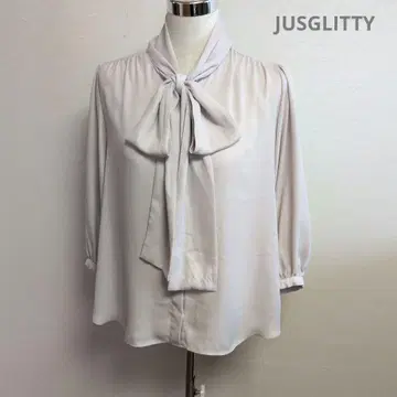 저스길리티 JUSGLITTY 리본 타이 포함 연보라 7부 소매 블라우스