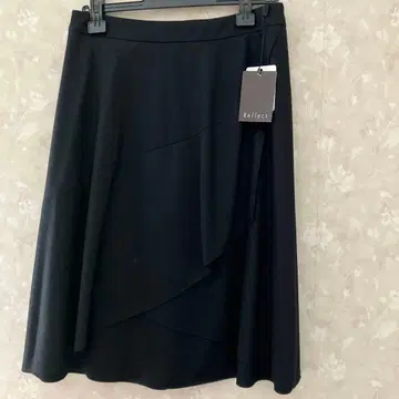 월드 리플렉트 플레어 스커트 11/L 미사용 하자 있음