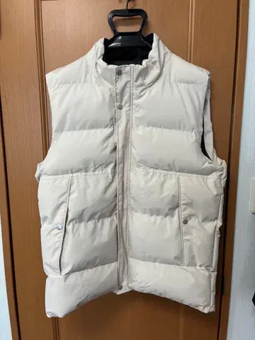 베이지 다운 베스트