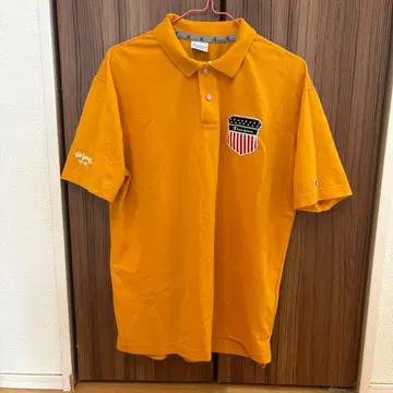 Champion 피케 셔츠 오렌지 성조기 디자인