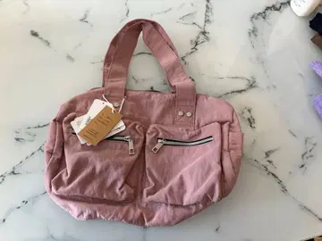 지퍼 포켓 부착 핑크 핸드백