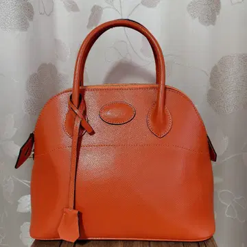 오렌지 가죽 핸드백