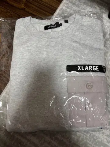 XLARGE 그레이 트레이닝복 포켓 부착
