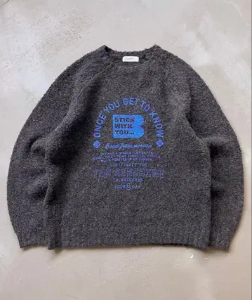 MUHET 그레이 니트 스웨터 로고 프린트