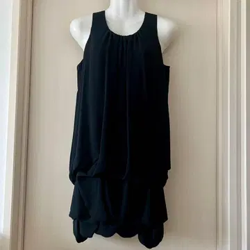 Radiate 슬리브리스 무릎 기장 원피스