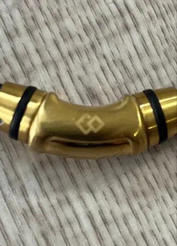 코란토테 목걸이 탑