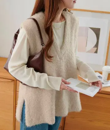 디스코트 페더 얀 튜닉 베스트 베이지