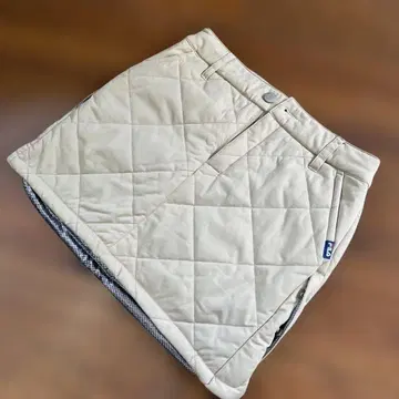 FILA 퀼팅 골프 스커트 베이지