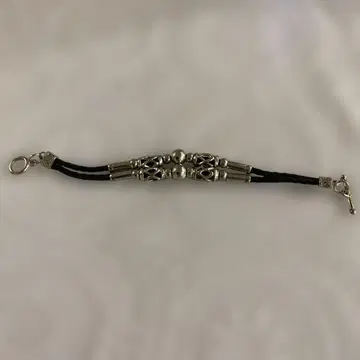 장식적인 뜨개질 실버 팔찌