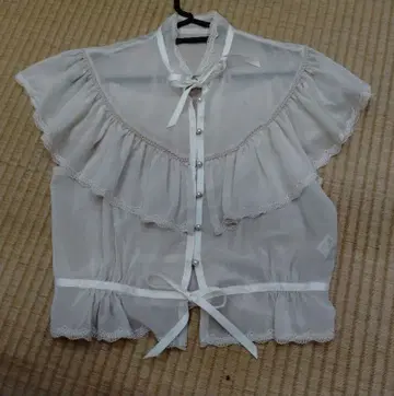 엑사트리크 블라우스