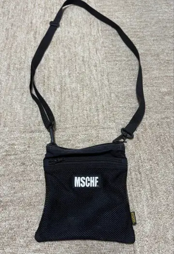 MSCHF 블랙 숄더백 사코슈