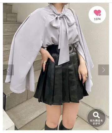 continuer de NICE CLAUP 보타이 볼륨 소매 블라우스