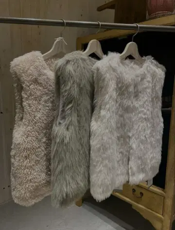 스나이델 바리에 인조 모피 베스트 화이트 프리 사이즈