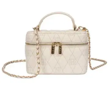 Her lip to Monogram Quilted Vanity Bag