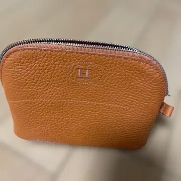 H 오렌지 가죽 파우치