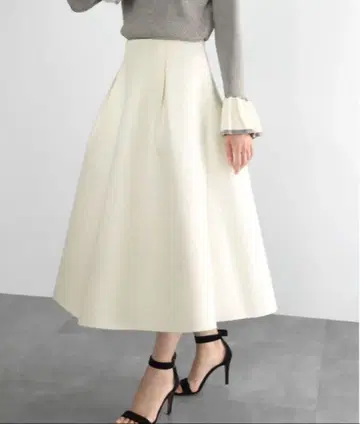 ELFRANK 본딩 종아리 기장 플레어 스커트 아이보리