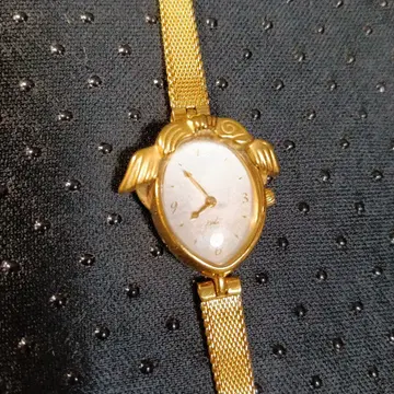 SALVADOR DALI 시간의 날개 골드 메쉬 손목시계