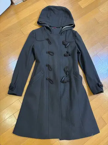 a primary 다크 브라운 후드 부착 더플 코트