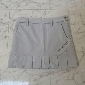 DESCENTE 라이트 그레이 플리츠 스커트