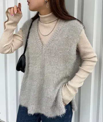 DISCOAT 라메 페더 얀 베스트 V넥 베스트