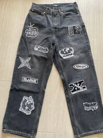 XLARGE 패치 데님 팬츠