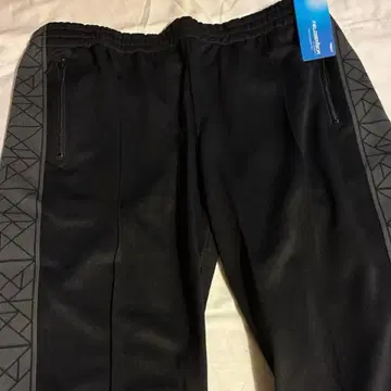 Tangram PUZZLE LINE TRACK PANTS