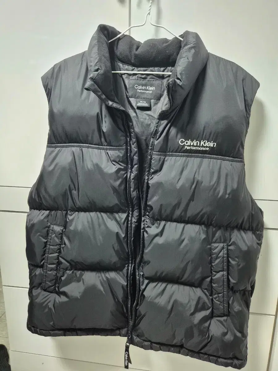 Calvin Klein padded vest, size 110.
