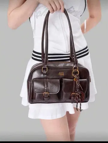 커피 브라운 핸드백 포켓 부착