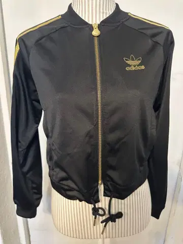 슈퍼스타 탄생 50주년 기념 모델 트랙탑 블랙&골드