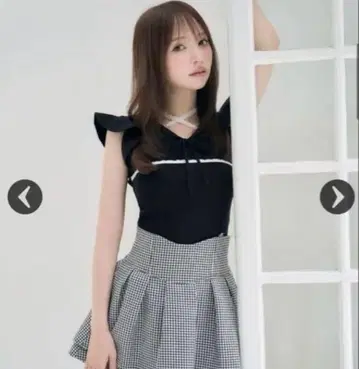 미셸 마카롱 슬리브리스 프릴 니트탑