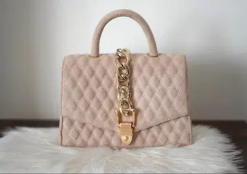 다리치 베이지 퀼팅 스웨이드 백