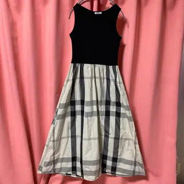 슬리브리스 체크 무늬 A라인 원피스
