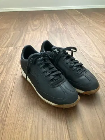 Puma 블랙 가죽 스니커즈