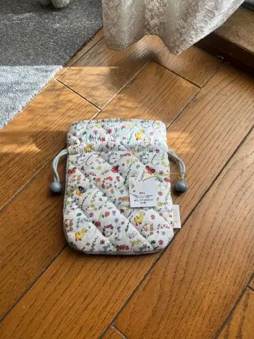 FILLER 하이디 패턴 퀼팅 파우치