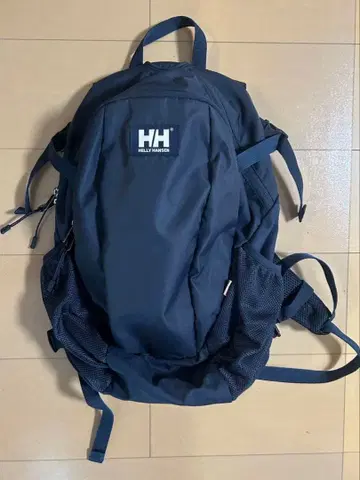 헬리 한센 네이비 백팩