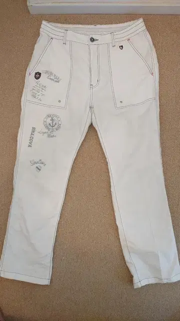 시나코바 화이트 팬츠