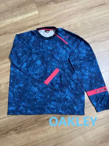 [ OAKLEY ] 피스테 윈드브레이커 네이비/레드